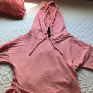 Pink cropped hoodie with cut back
